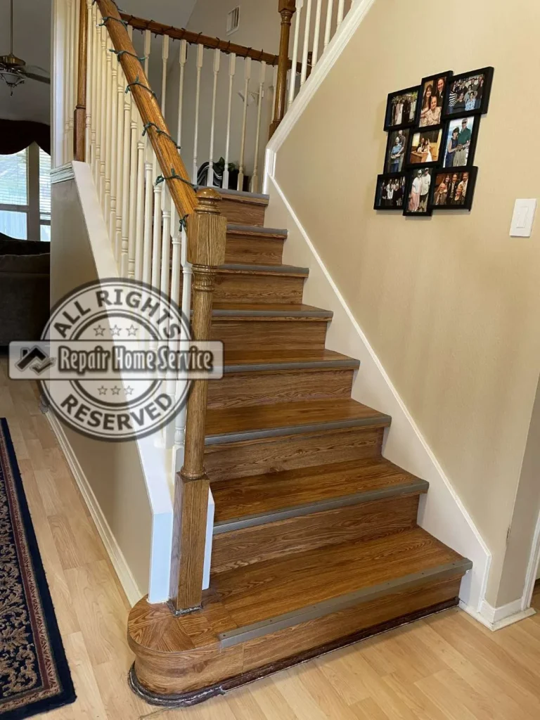 Stairwell view during custom stair remodel in Houston TX with existing stairs opened for on-site tread and riser work