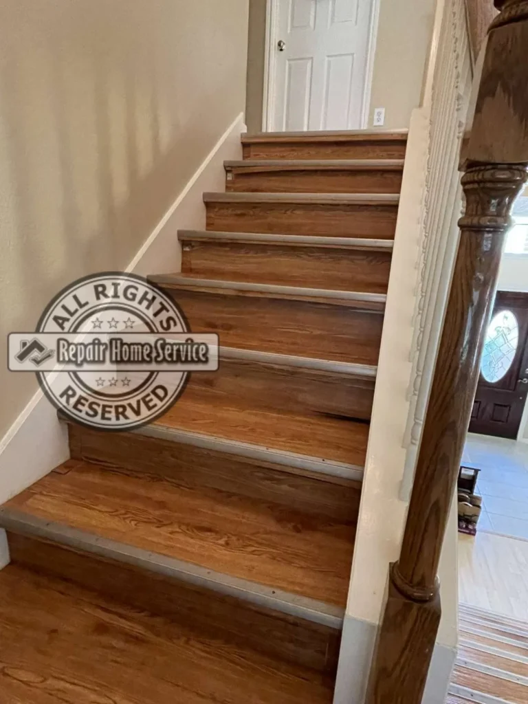 Lower section of interior stairs before remodel in Houston TX showing existing finish and layout before new tread installation