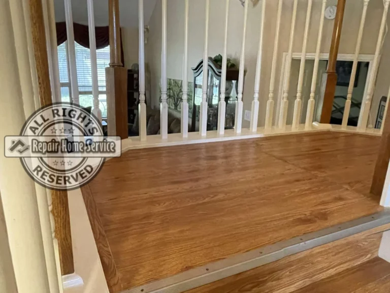 In-progress stair remodel in Houston TX with custom red oak treads being fitted and aligned during on-site carpentry work