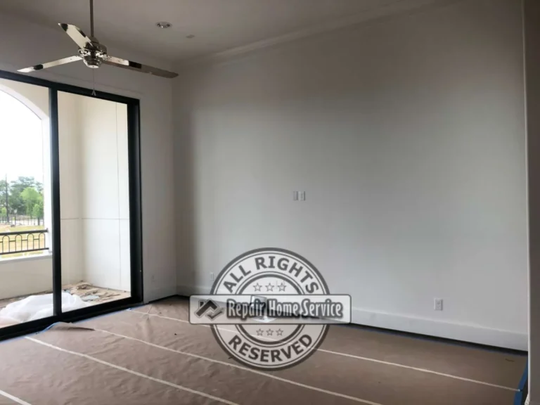 Before photo of empty Houston living room wall prepared for custom built-in bookcase and entertainment cabinet installation