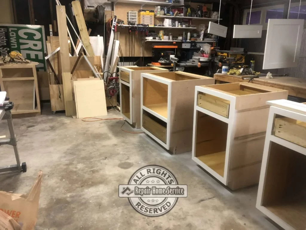 Custom butler pantry with off-white shaker cabinets and soapstone countertop in Houston TX