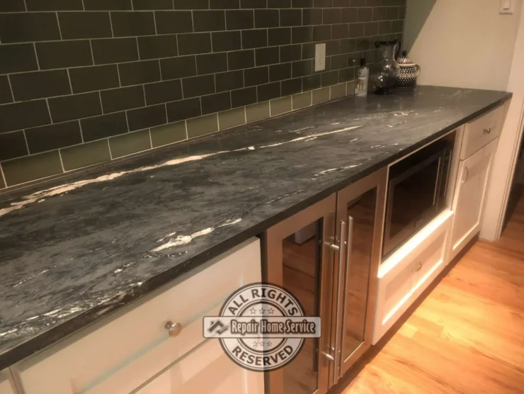 Butler pantry remodel featuring shaker cabinet design and soapstone countertop installation in Houston TX