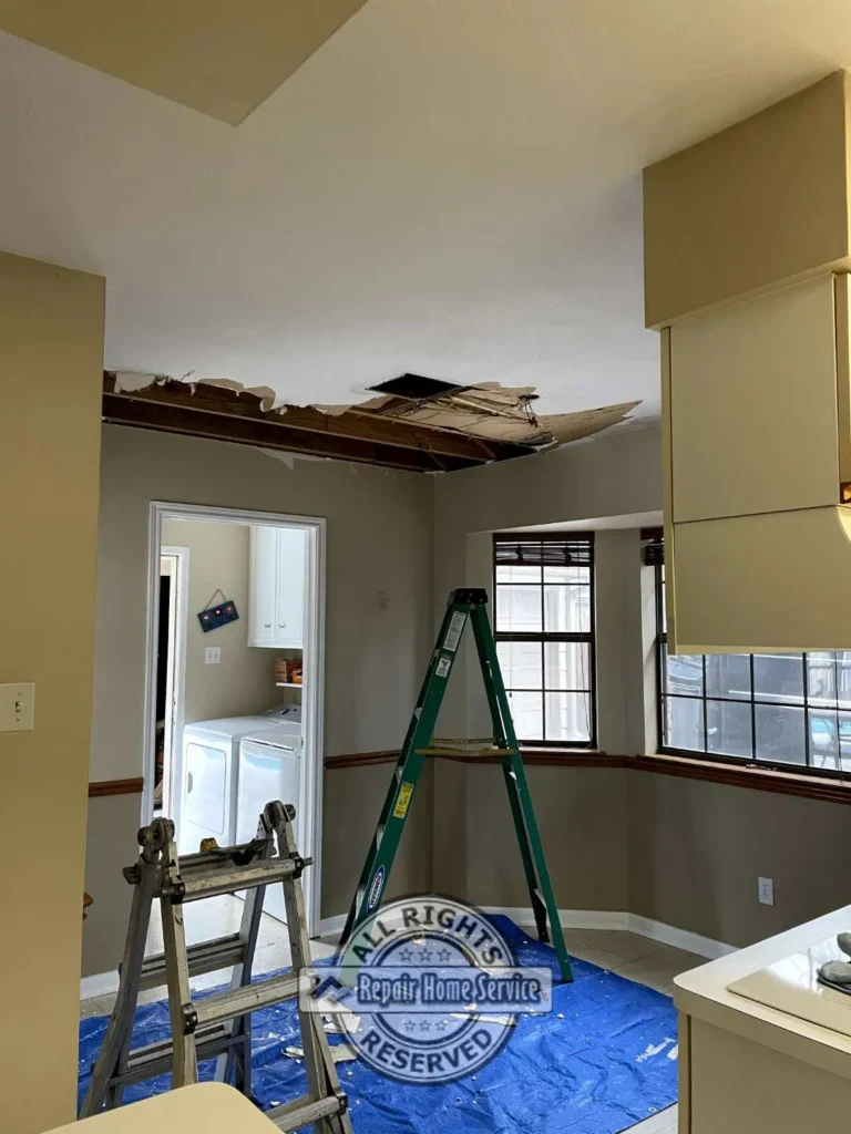 Ceiling access openings and protective plastic barriers installed for interior drywall repair work in Houston TX home.
